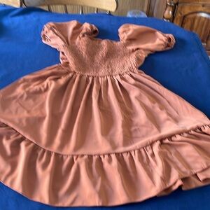 Used good condition, bubble sleeve, ruffled dress
